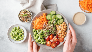 A lady show healthy diet food in bowl 