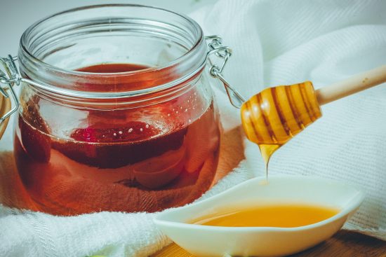 Honey has been praised for centuries as nature’s golden nectar. From soothing sore throats to healing wounds, this sweet substance has earned a special place in traditional medicine and modern kitchens alike. But here’s the twist: while honey can be a healing powerhouse, it can also pose hidden risks if not used wisely. Let’s uncover the truth behind this sticky superfood. A Brief History of Honey Honey has been harvested and consumed for over 8,000 years. Ancient Egyptians used it in embalming and wound care, Ayurveda recommended it for digestion and skin, and Greeks called it the “food of the gods.” Beyond its sweetness, honey has always carried a reputation for health and healing. What Makes Honey Unique? Unlike refined sugar, honey is a natural blend of enzymes, amino acids, vitamins, minerals, and antioxidants. Its rich composition makes it far more than just a sweetener. Key components include: Antioxidants – flavonoids and phenolic acids that fight free radicals. Enzymes – like glucose oxidase, which gives honey antibacterial power. Nutrients – small amounts of iron, potassium, calcium, and magnesium. The Healing Side of Honey 1. Boosts Immunity Honey’s antioxidants strengthen your immune system, helping the body defend against infections. 2. Soothes Throat & Cough A spoonful of honey can calm irritation, coat the throat, and reduce nighttime coughing—especially helpful for children over age one. 3. Supports Digestion Honey promotes healthy gut bacteria and can relieve mild digestive issues like acid reflux or indigestion. 4. Natural Energy Booster Its natural sugars provide a quick energy source without the crash caused by refined sugar. 5. Wound Healing & Skin Benefits Medical-grade honey (like Manuka) has antibacterial properties and is used in healing burns, cuts, and acne. The Hidden Dangers of Honey While honey has remarkable benefits, one drop used incorrectly could be harming you: High Sugar Content – Excess consumption can spike blood sugar and lead to weight gain. Infant Botulism Risk – Babies under 1 year should never consume honey due to harmful spores that can cause illness. Allergic Reactions – Some people may react to pollen or bee proteins in honey. Dental Issues – Sticky sugars can increase the risk of cavities if oral hygiene is neglected. Adulteration – Many commercial honeys are diluted with corn syrup or artificial sweeteners, reducing their health benefits. Raw vs. Processed Honey Raw Honey – Unpasteurized, contains enzymes, pollen, and nutrients; better for health. Processed Honey – Heated and filtered, often losing many beneficial compounds. Always read labels carefully and choose trusted sources to avoid adulterated honey. How to Use Honey the Right Way ✅ Add a teaspoon to warm water with lemon for digestion and detox. ✅ Use honey as a natural sweetener in tea instead of refined sugar. ✅ Apply raw honey as a face mask for glowing skin. ✅ Consume before bedtime to improve sleep quality. ❌ Avoid giving honey to children under 1 year. ❌ Don’t overuse—limit to 1–2 teaspoons per day for adults. Healing or Harming: The Verdict Honey can heal or harm depending on how you use it. In moderation and in its raw form, honey is a powerful natural remedy—supporting immunity, digestion, skin, and energy. But in excess, or in adulterated form, it can cause more harm than good. So, the next time you drizzle honey on your toast or stir it into tea, remember: one drop has the power to heal—but only if you use it wisely.